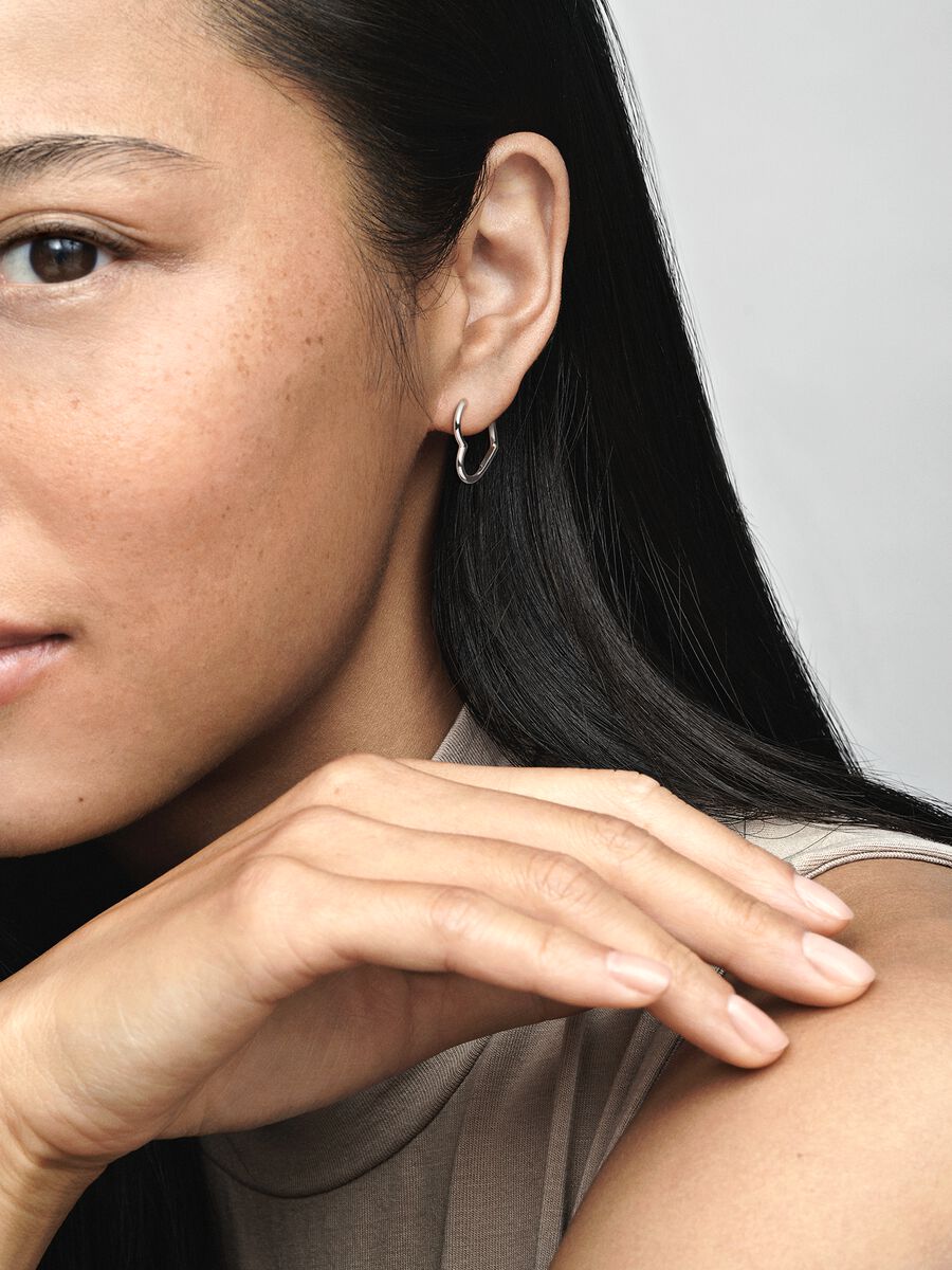 Boucles d'oreilles créoles cœur asymétrique