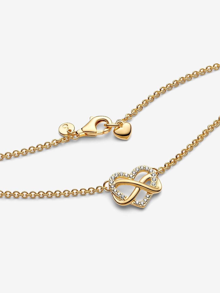 Collier scintillant avec cœur et symbole d’infini