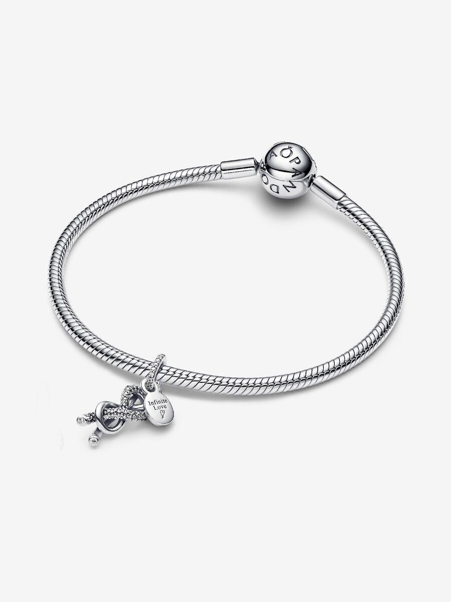 Charm-pendentif Nœud infini pavé
