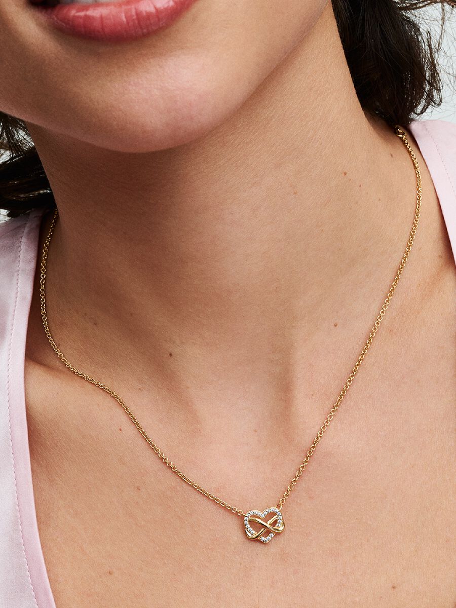 Collier scintillant avec cœur et symbole d’infini