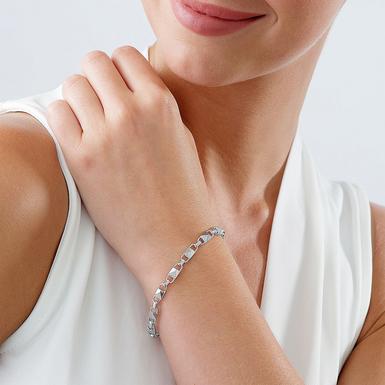 MK Bracelet signature souple à maillons cz