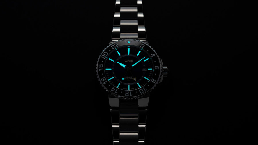 Aquis GMT Date