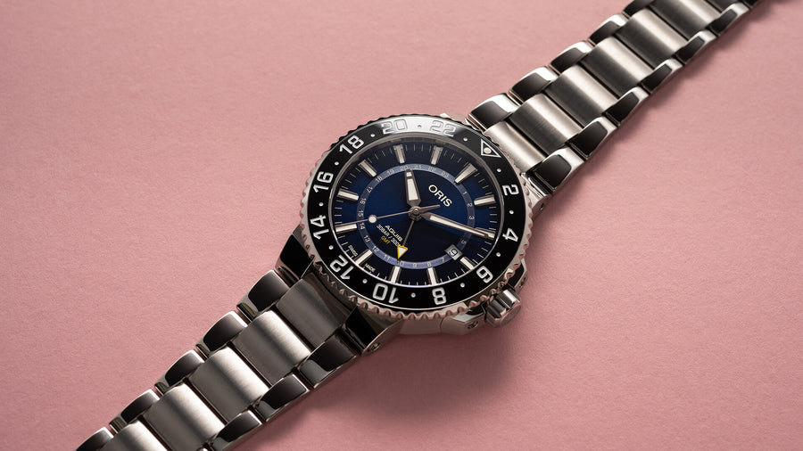 Aquis GMT Date