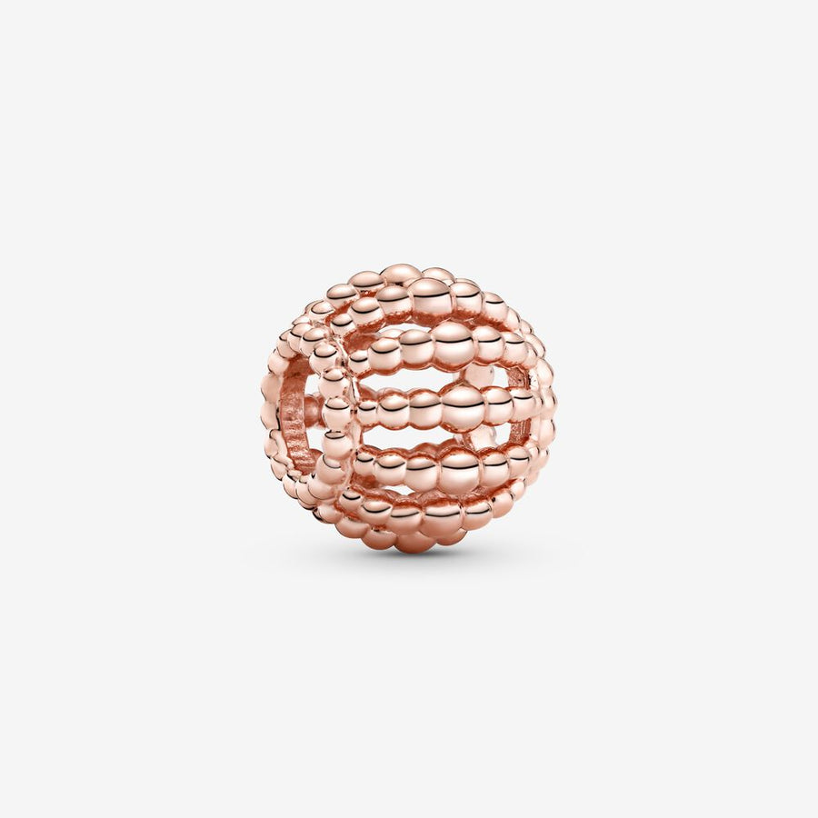Charm ajouré perlé