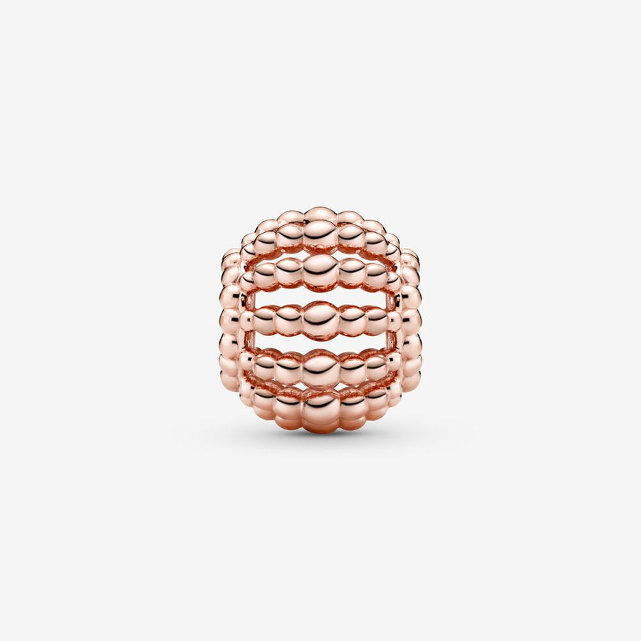 Charm ajouré perlé