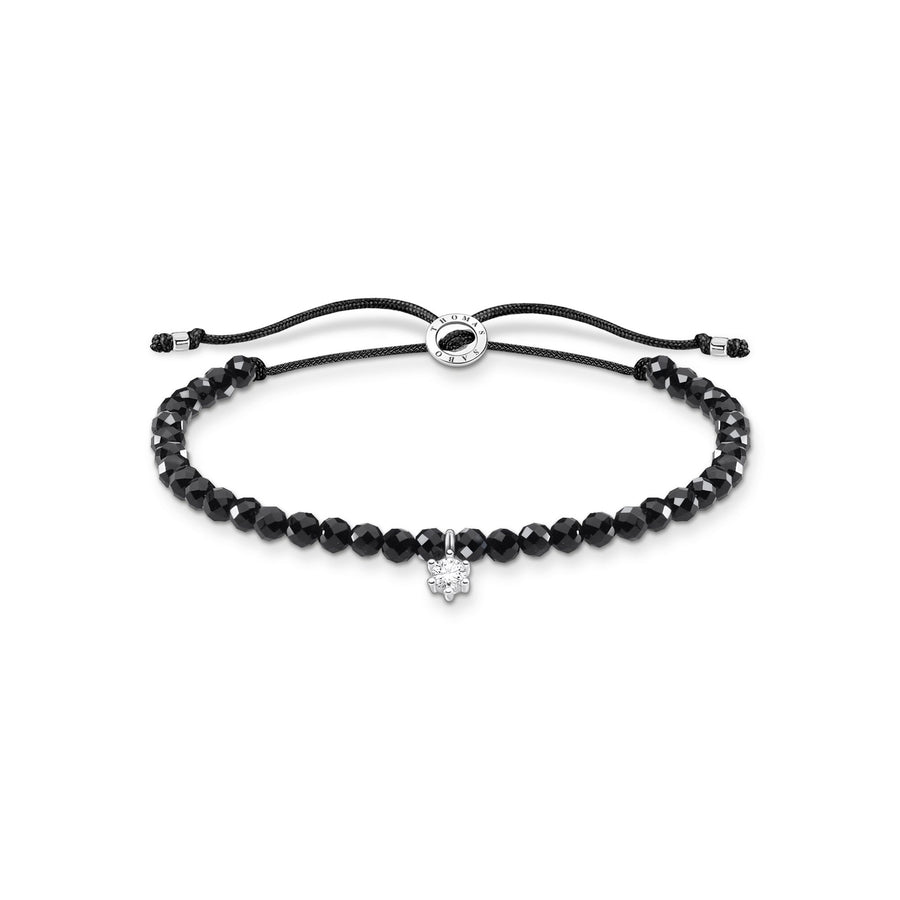 Bracelet perles noires avec pierre blanche