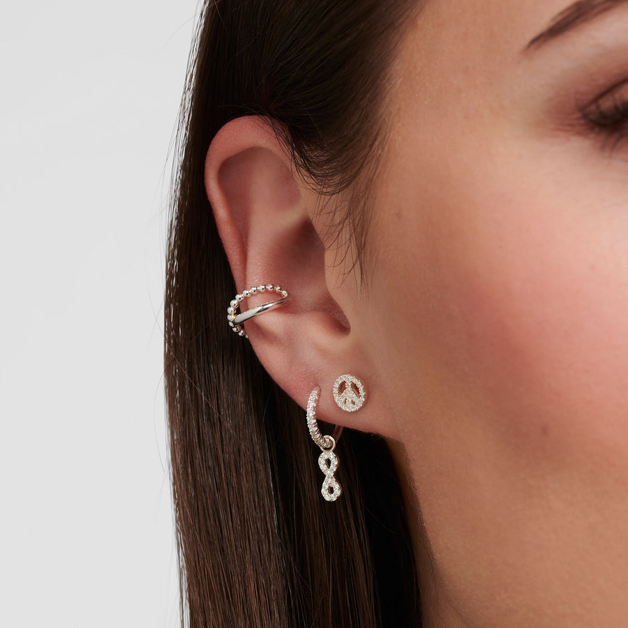 Clou d'oreille unique peace argent