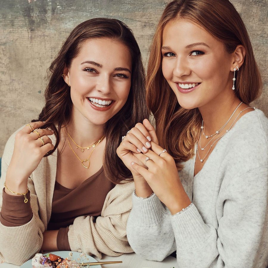 Bague perles avec pierres blanches or